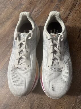 New Balance Women's Cream/White Running Sneakers with Pink and Orange Accents